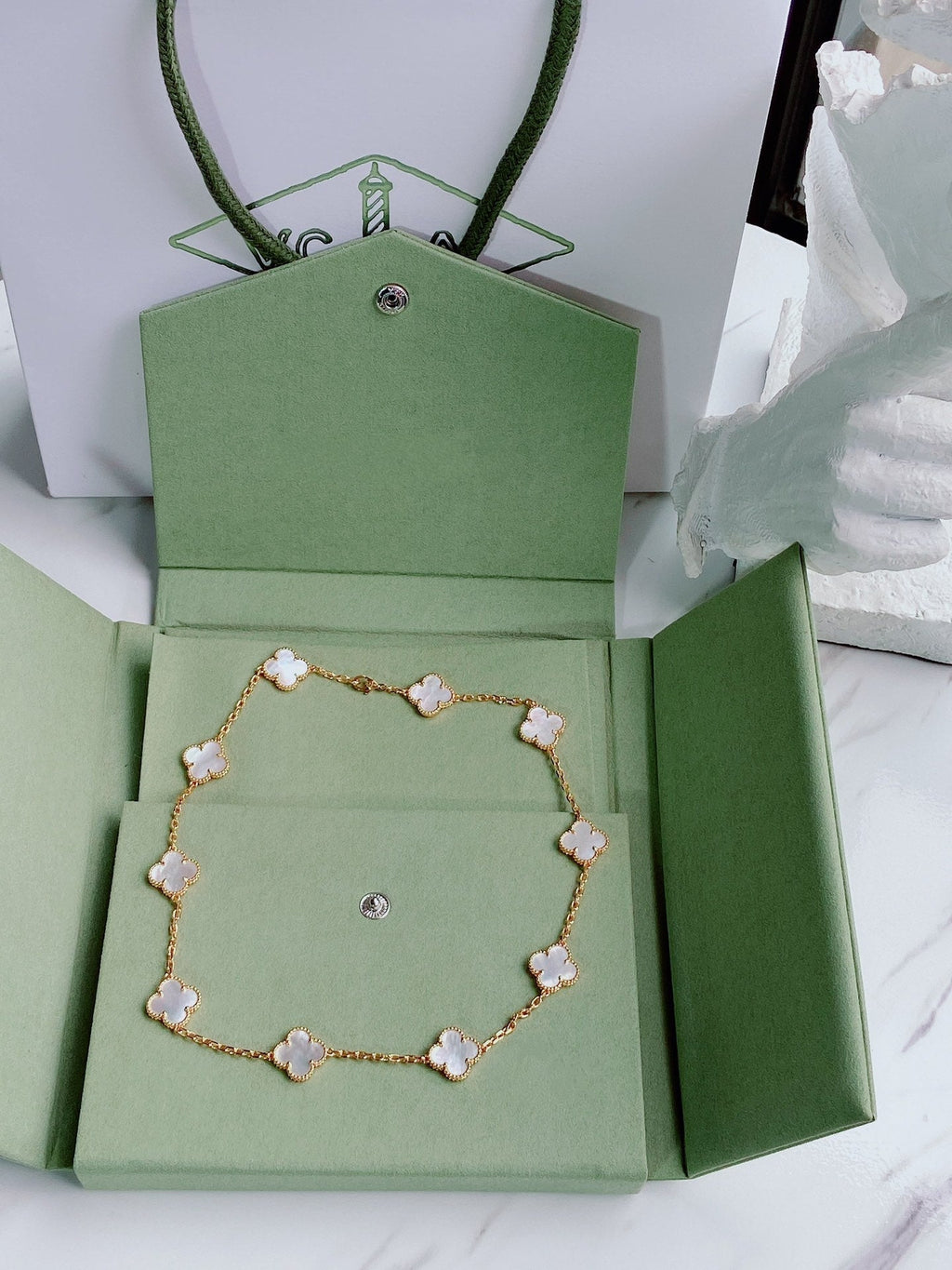 VINTAGE MOP NECKLACE 10 MOTIFS GOLD