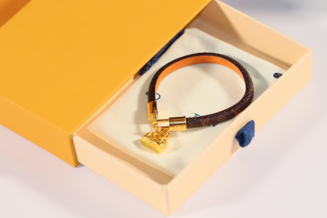 LV ALMA PINK GOLD CANVAS