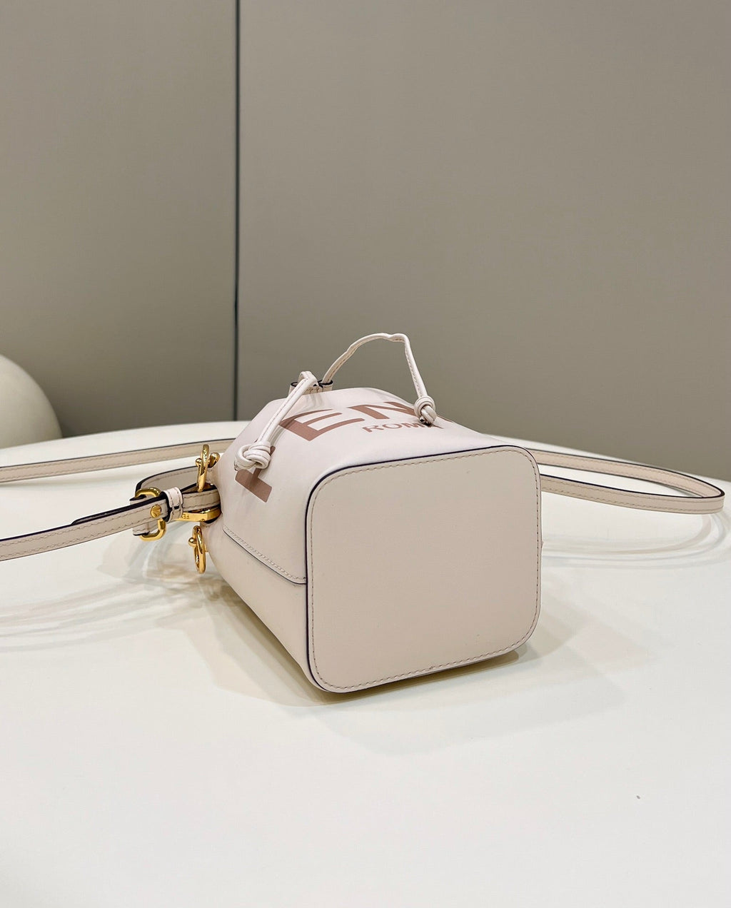 MON TRESOR MINI 18 BAG IN WHITE CALFSKIN FF WITH GOLD HARDWARE