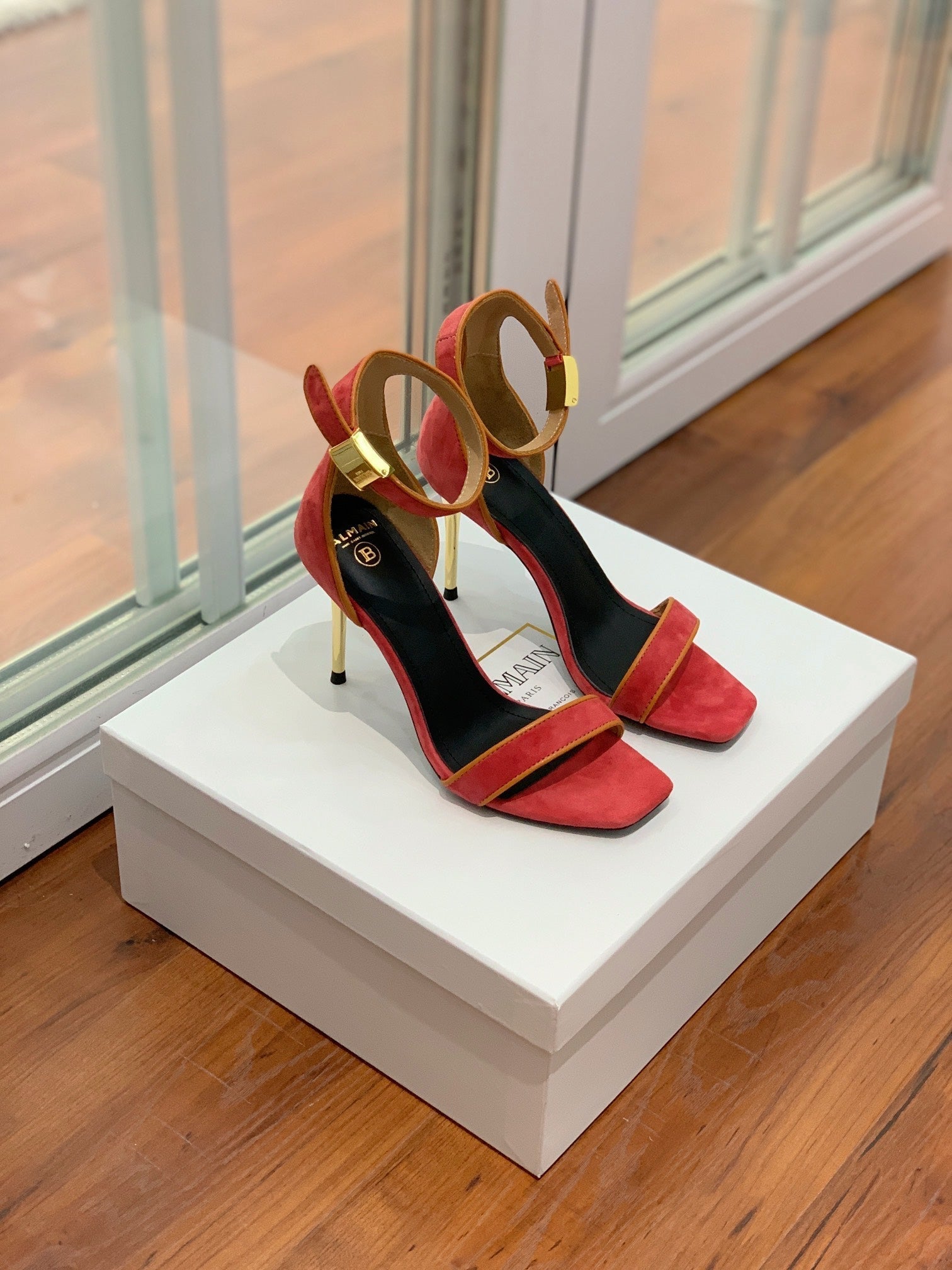 BALMAIN 25S UMA HEELED SANDALS 105MM IN RED SUEDE GOLD HARDWARE