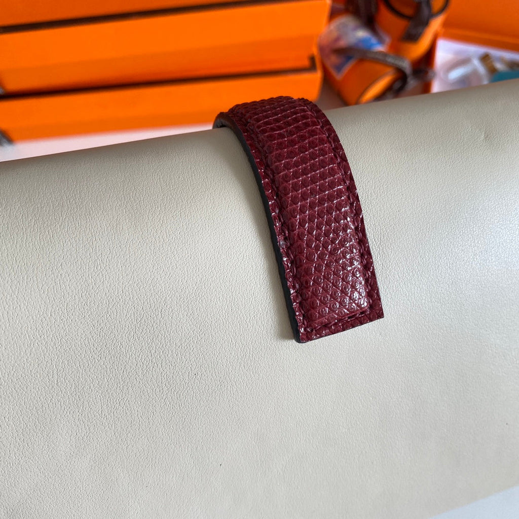 JIGE ELAN 29 CLUTCH IN WHITE CALFSKIN WITH GARNET RED LIZARD SKIN