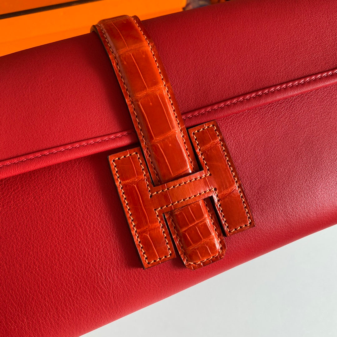 JIGE ELAN 29 CLUTCH IN RUBY RED CALFSKIN WITH APPLE RED LIZARD SKIN