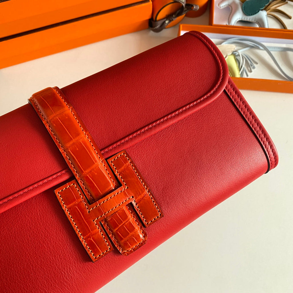 JIGE ELAN 29 CLUTCH IN RUBY RED CALFSKIN WITH APPLE RED LIZARD SKIN