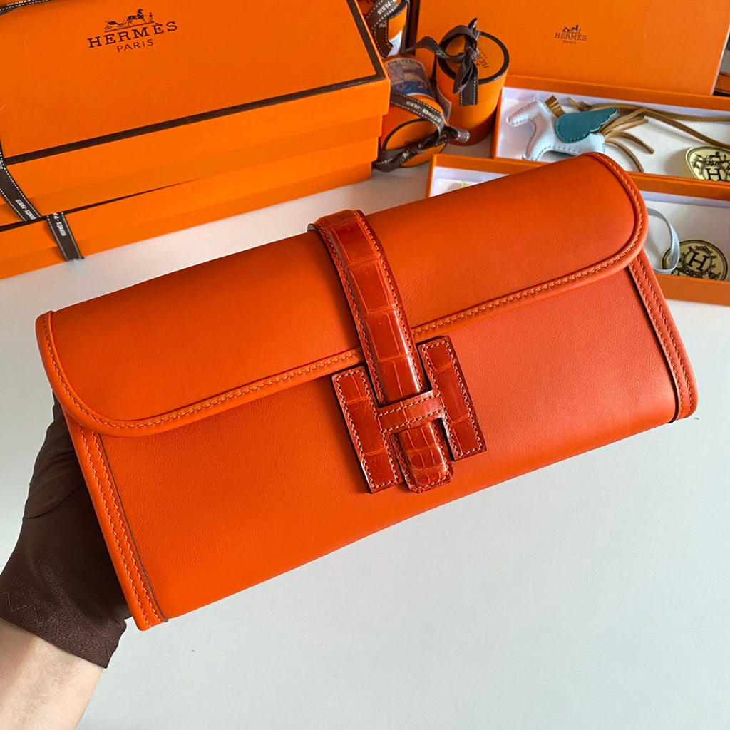 JIGE ELAN 29 CLUTCH IN BRIGHT ORANGE CALFSKIN WITH LIZARD SKIN