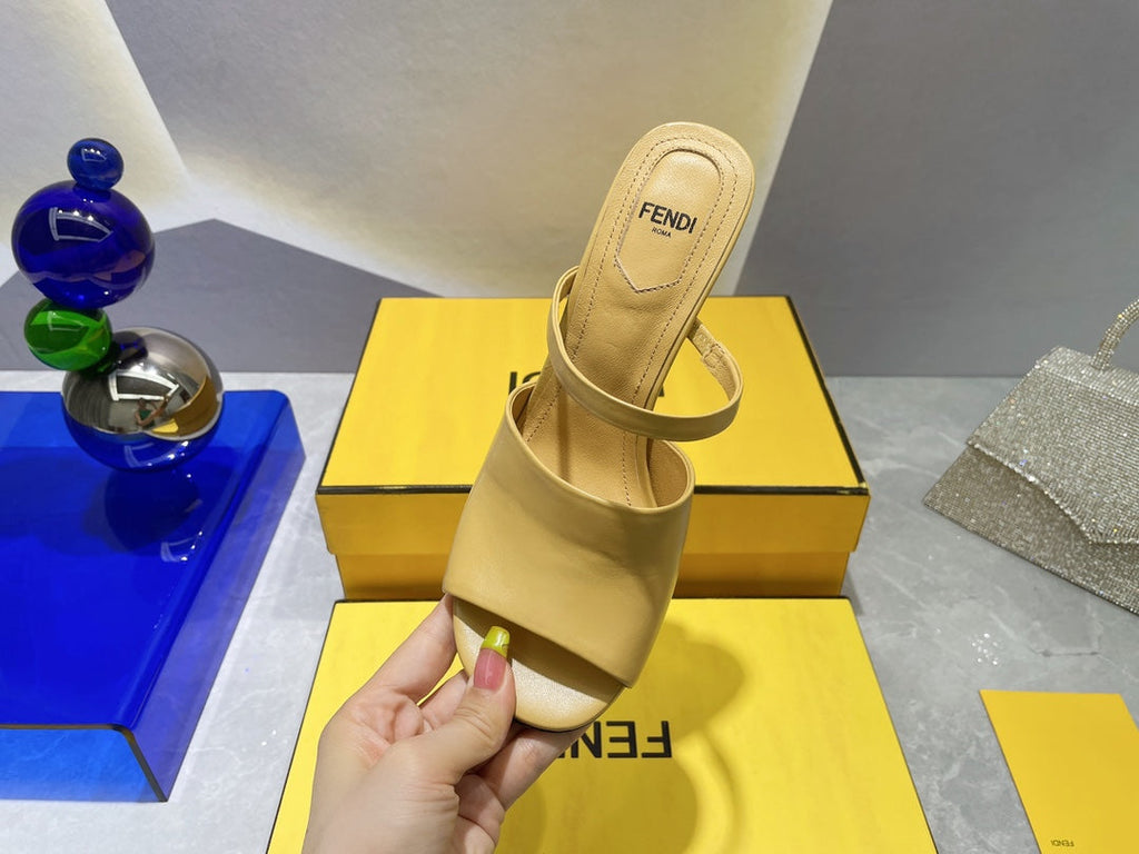 FENDI FIRST 95 MM HIGH-HEELED SANDAL IN MUSTARD YELLOW LAMBSKIN GOLD HARDWARE