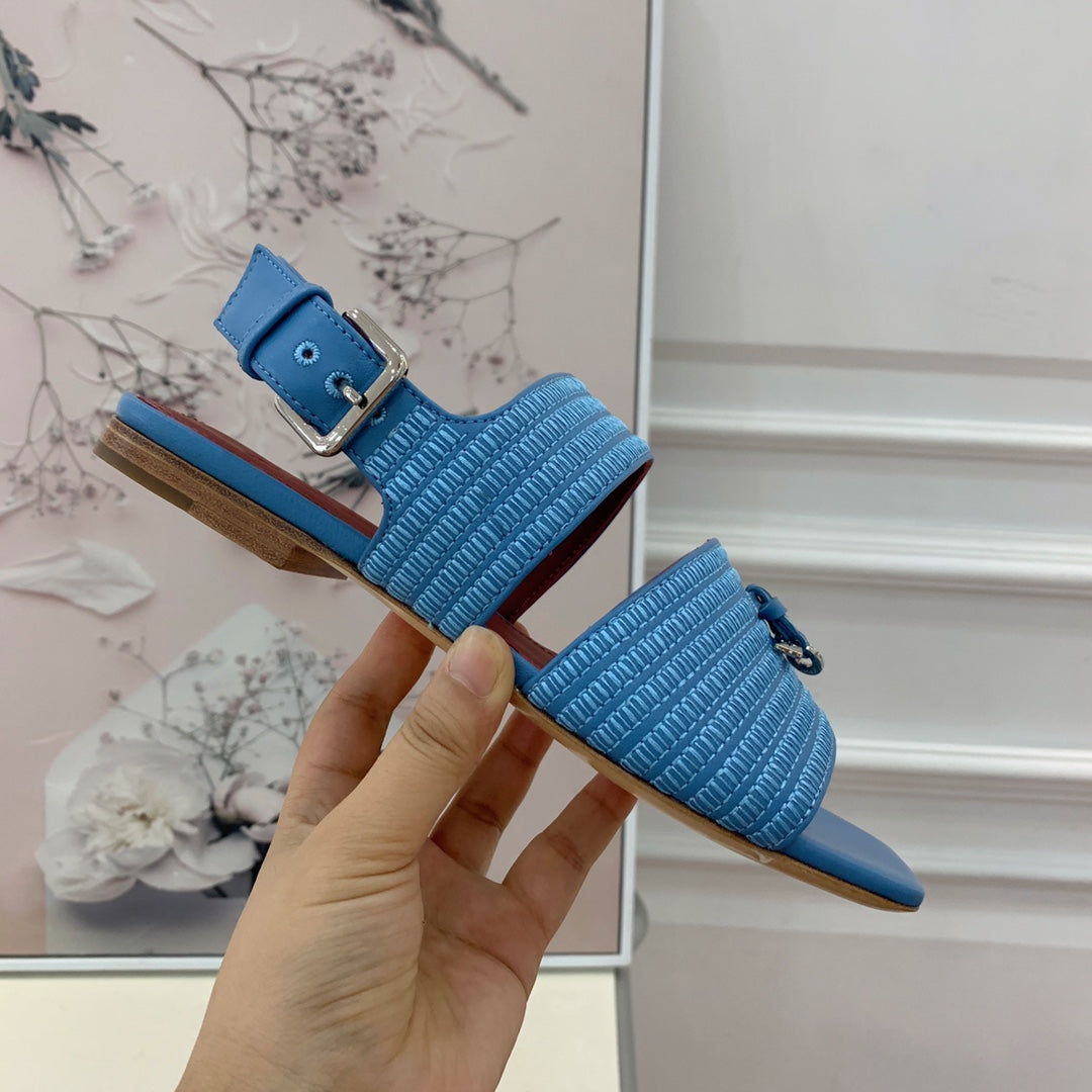 LP RAFFIA CHARMS STRAP FLATS SANDAL SKY CALFSKIN