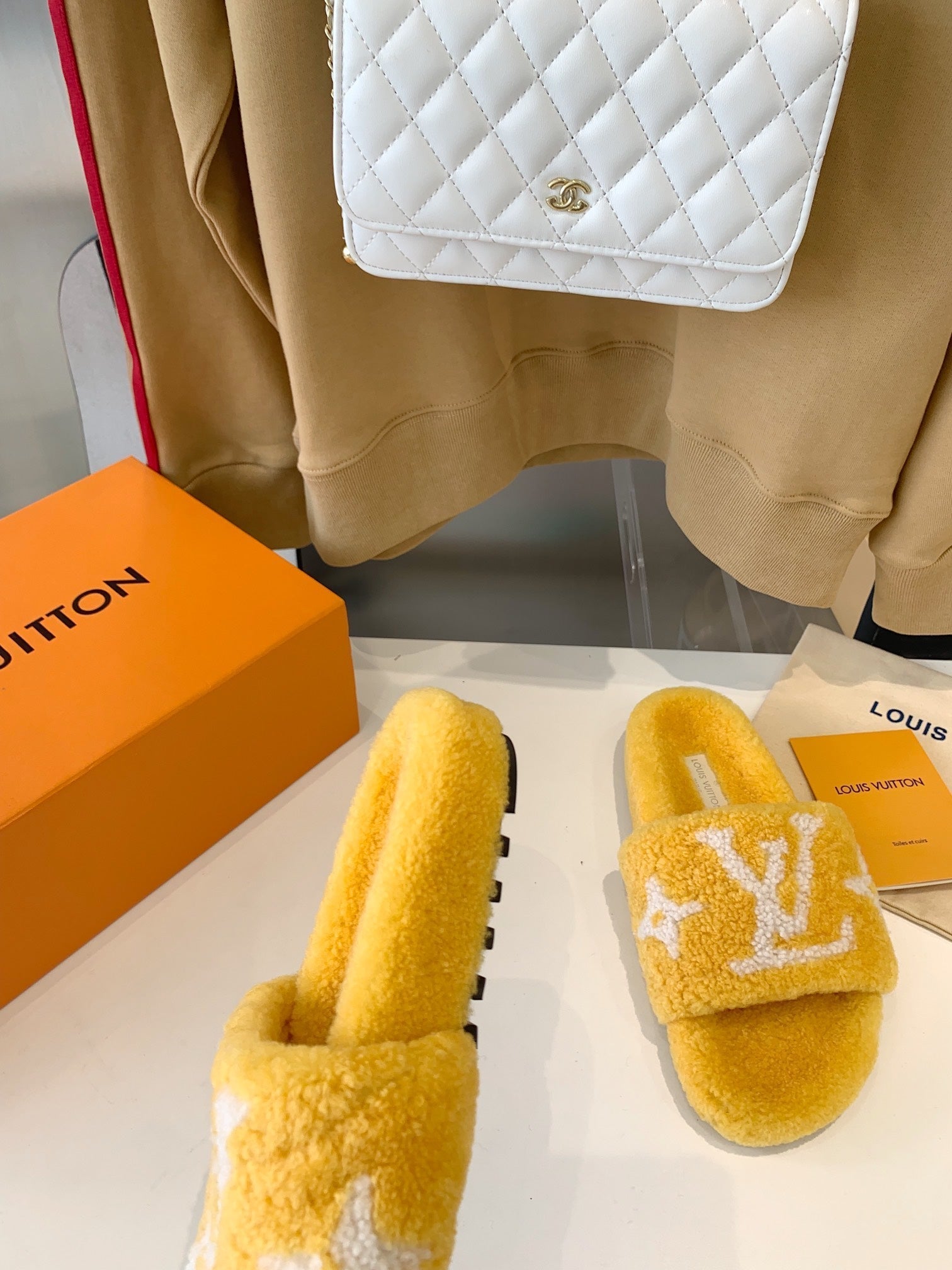 LV WOMEN'S PASEO FLAT SLIPPER IN YELLOW FLEECE WITH WHITE LOGO