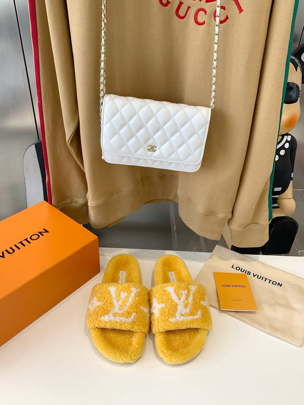LV WOMEN'S PASEO FLAT SLIPPER IN YELLOW FLEECE WITH WHITE LOGO