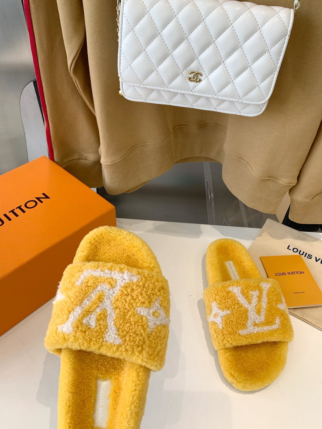LV WOMEN'S PASEO FLAT SLIPPER IN YELLOW FLEECE WITH WHITE LOGO