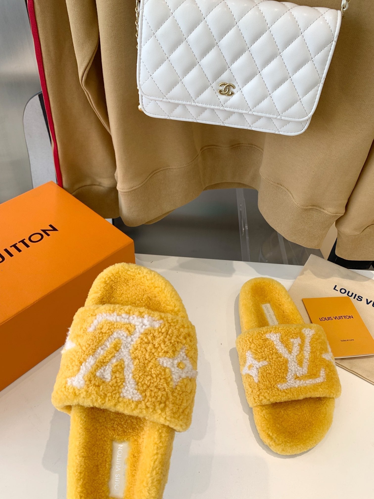 LV WOMEN'S PASEO FLAT SLIPPER IN YELLOW FLEECE WITH WHITE LOGO