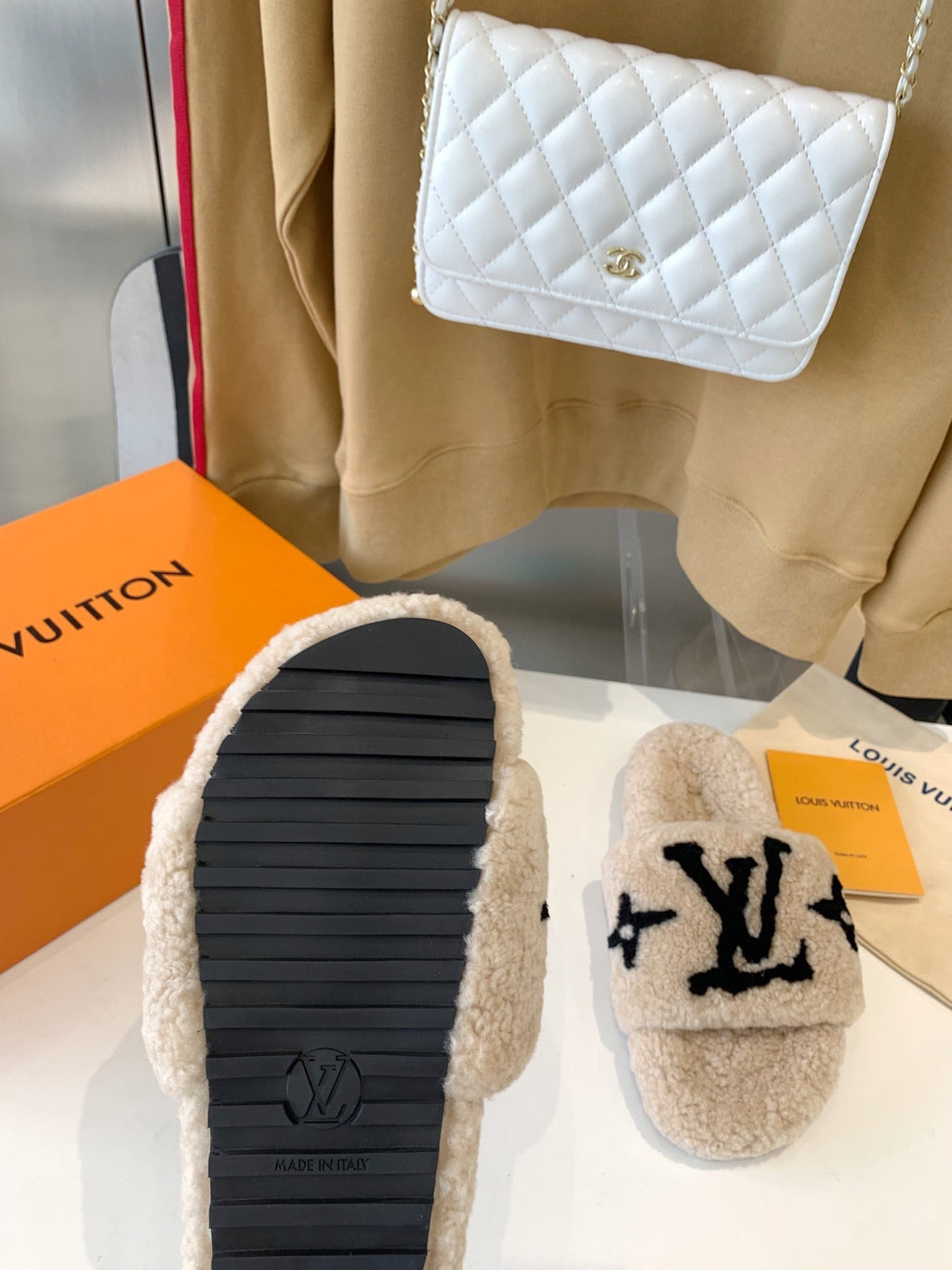 LV WOMEN'S PASEO FLAT SLIPPER IN TAN BROWN FLEECE WITH BLACK LOGO