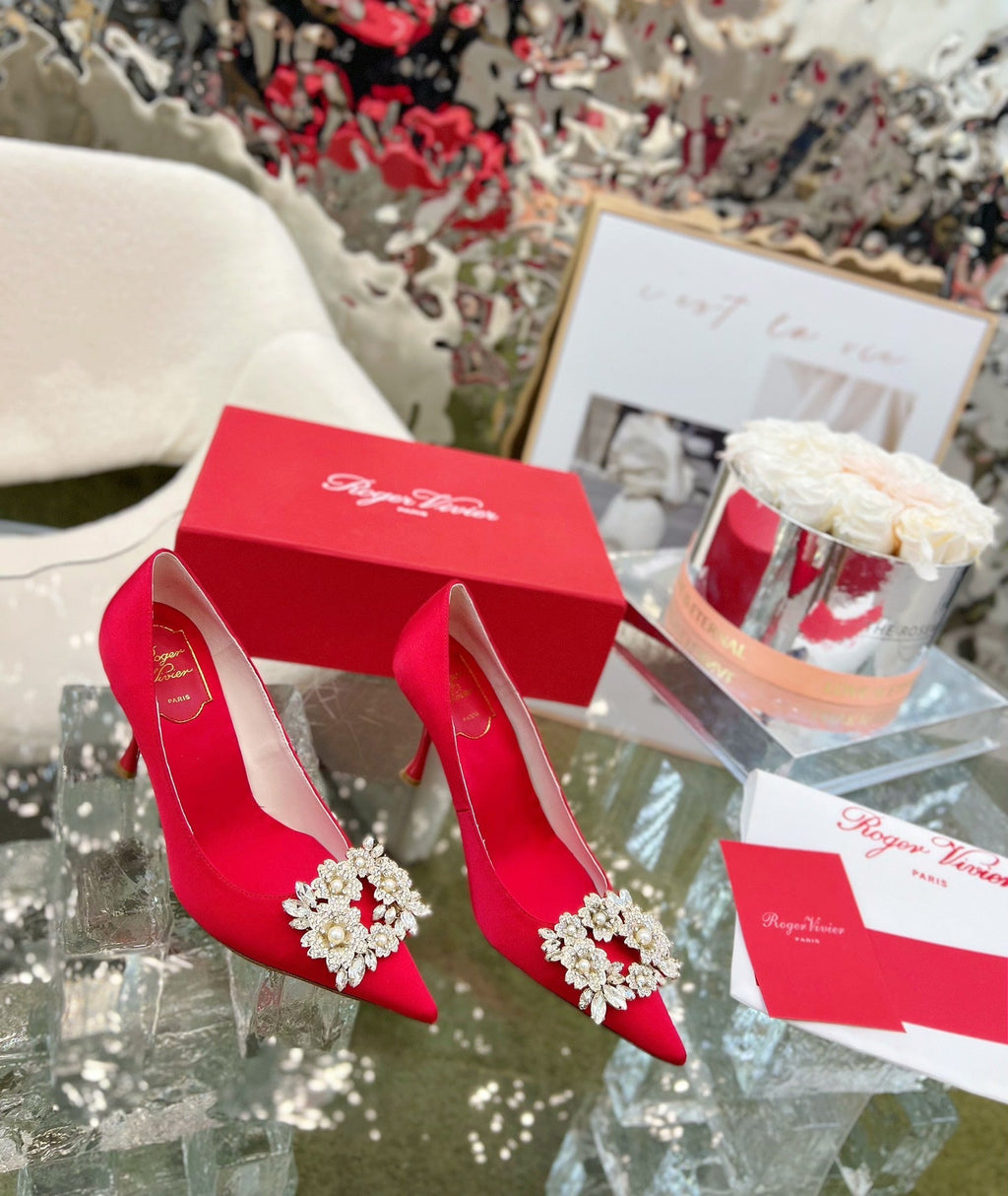 EFFLORESCENCE POINTED-TOE PUMPS IN RED SATIN WITH CRYSTAL BUCKLE