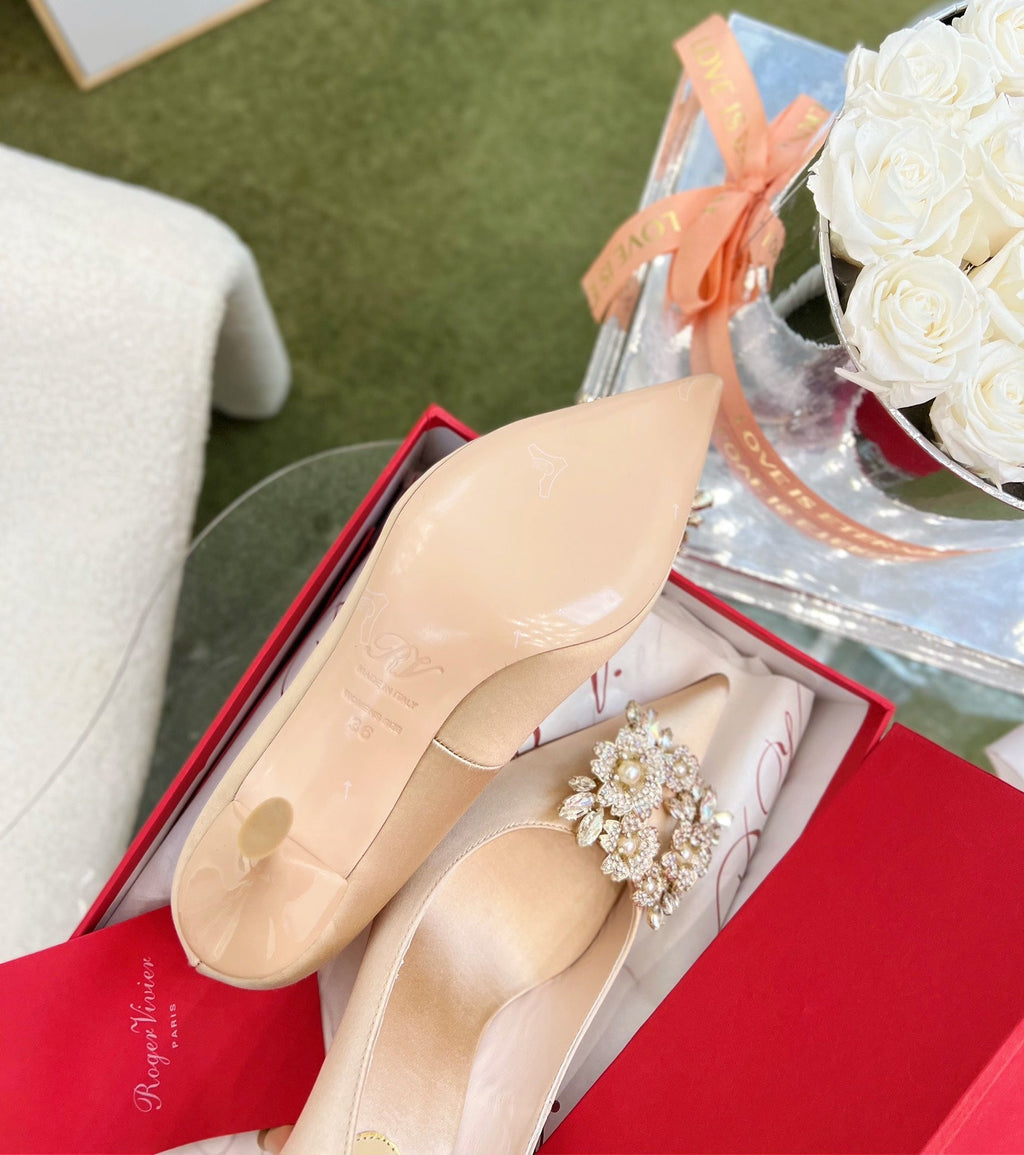 EFFLORESCENCE POINTED-TOE PUMPS IN NUDE SATIN WITH CRYSTAL BUCKLE