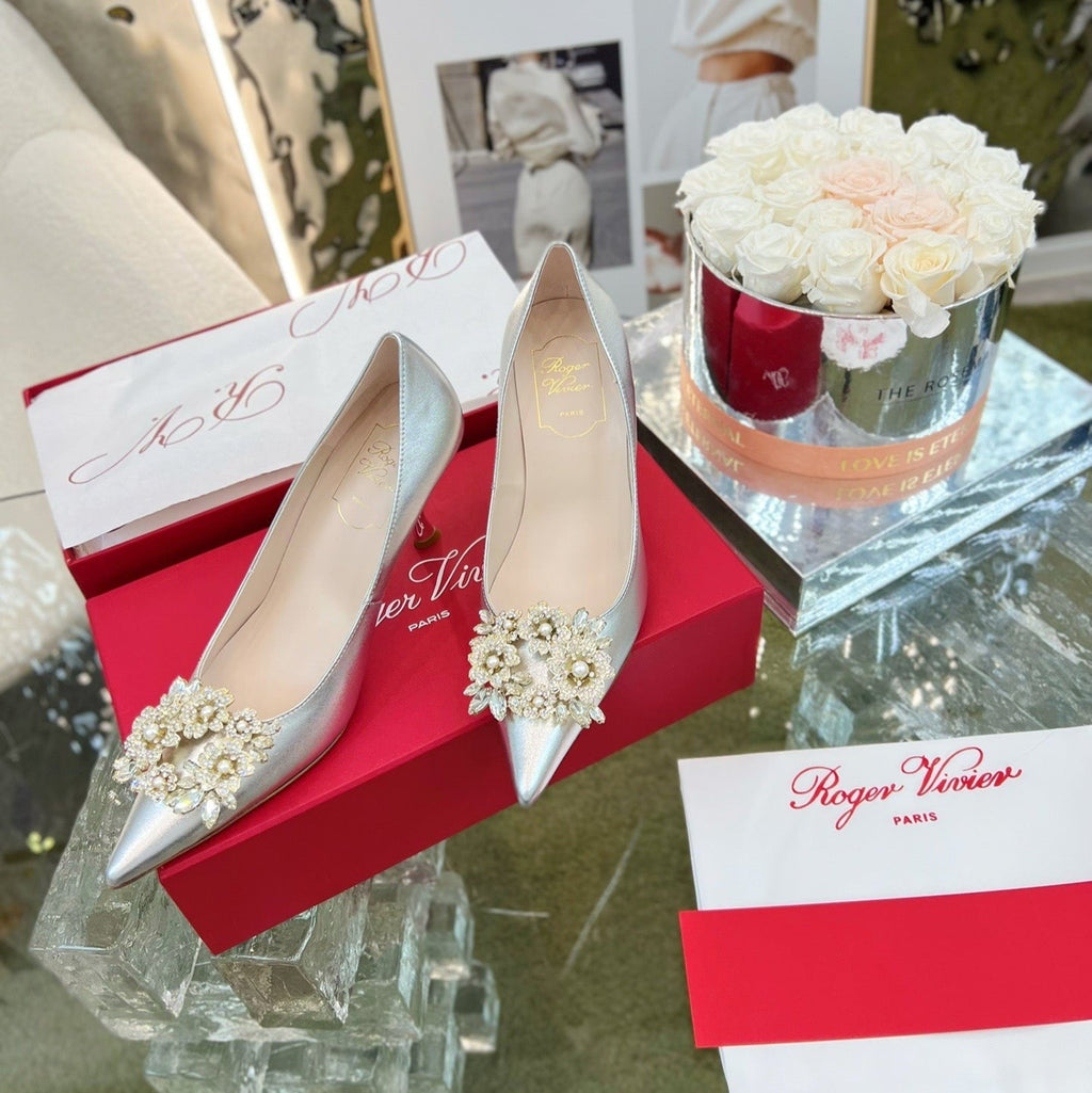 EFFLORESCENCE POINTED-TOE PUMPS 85MM IN SILVER SATIN WITH CRYSTAL BUCKLE