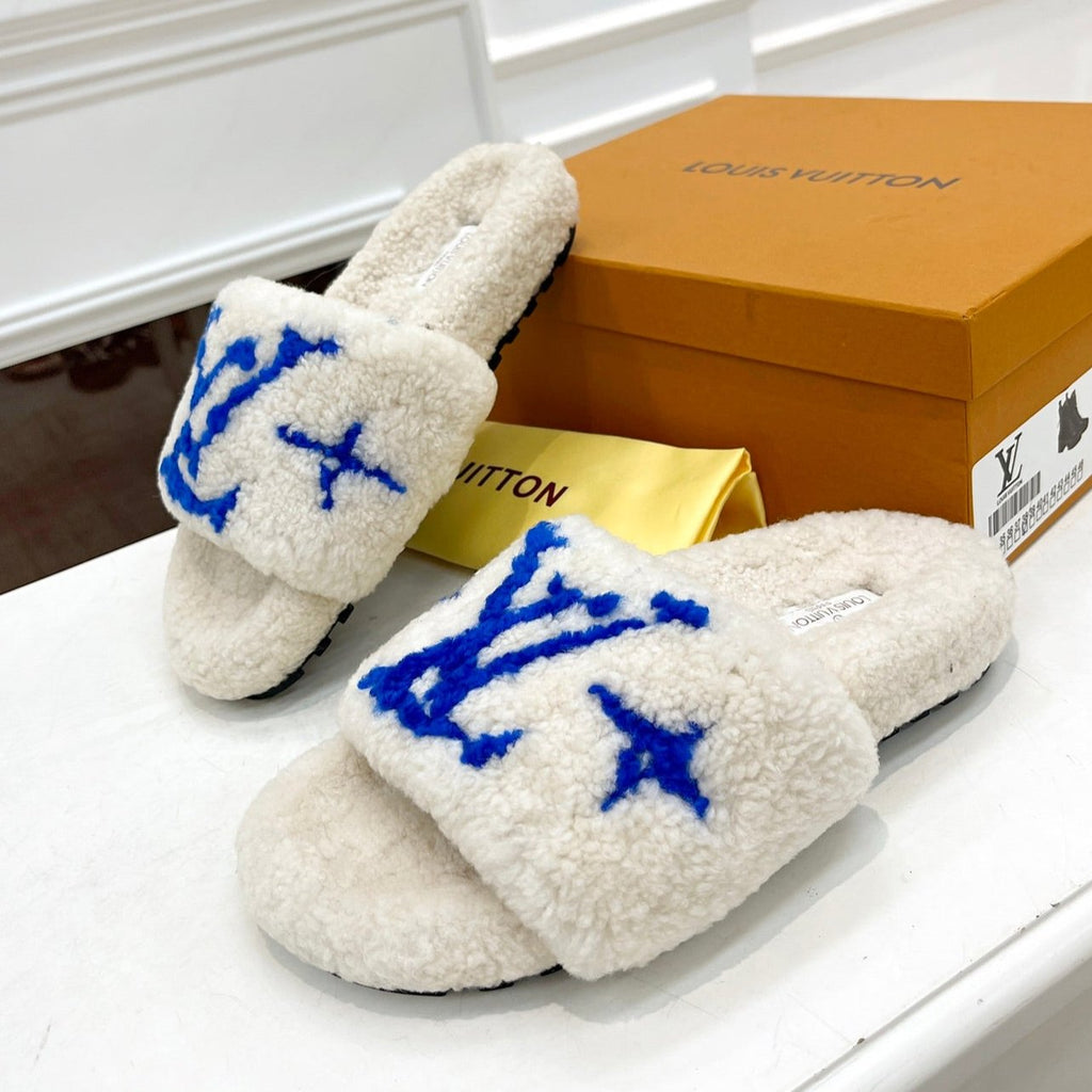 LV FLAT SLIPPER IN WHITE MIX COBALT BLUE SHEARLING