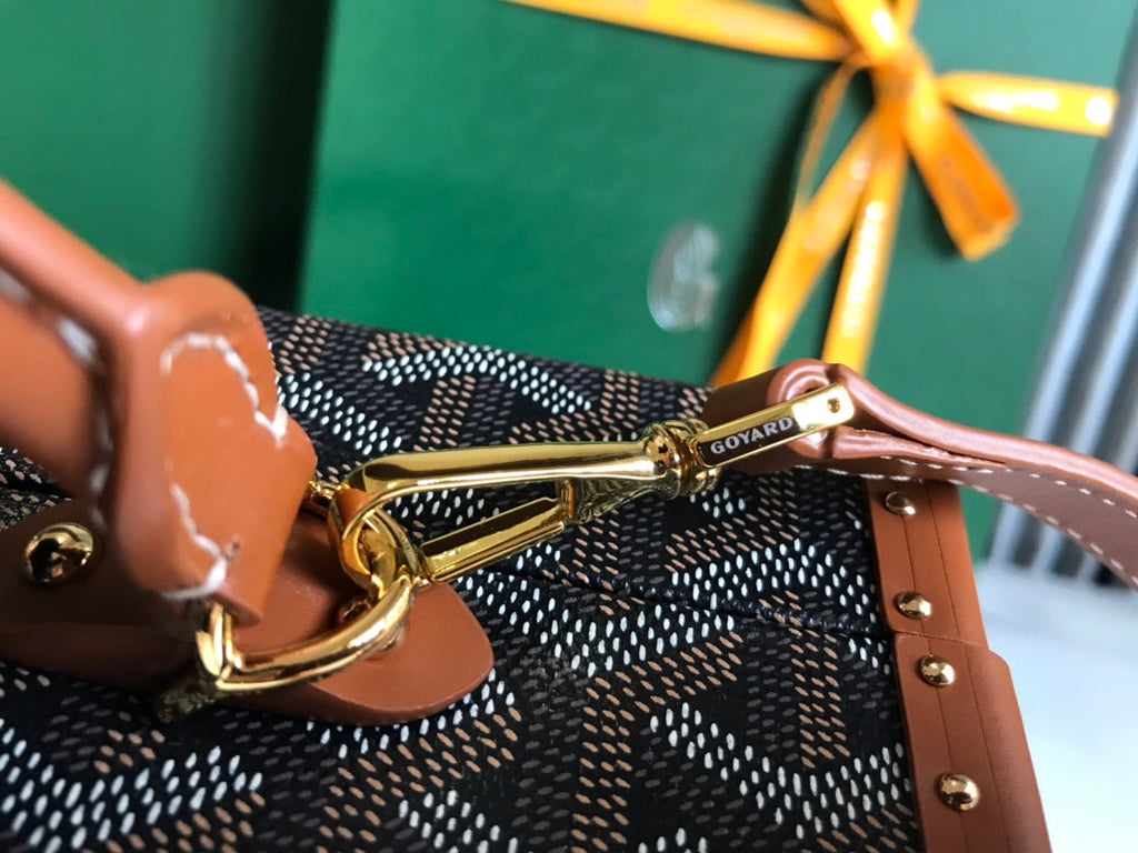 GRAND HÔTEL TRUNK BAG 24 IN BLACK GOYARDINE CANVAS AND TAN CALFSKIN