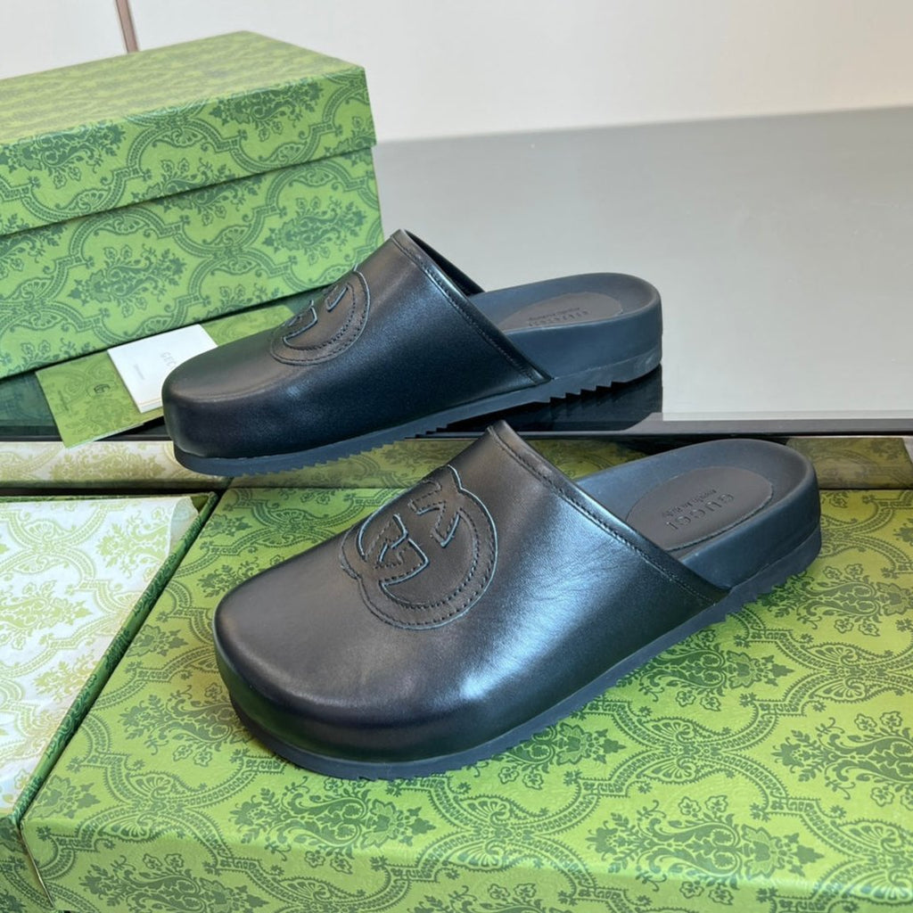 INTERLOCKING G MULE IN BLACK CALFSKIN