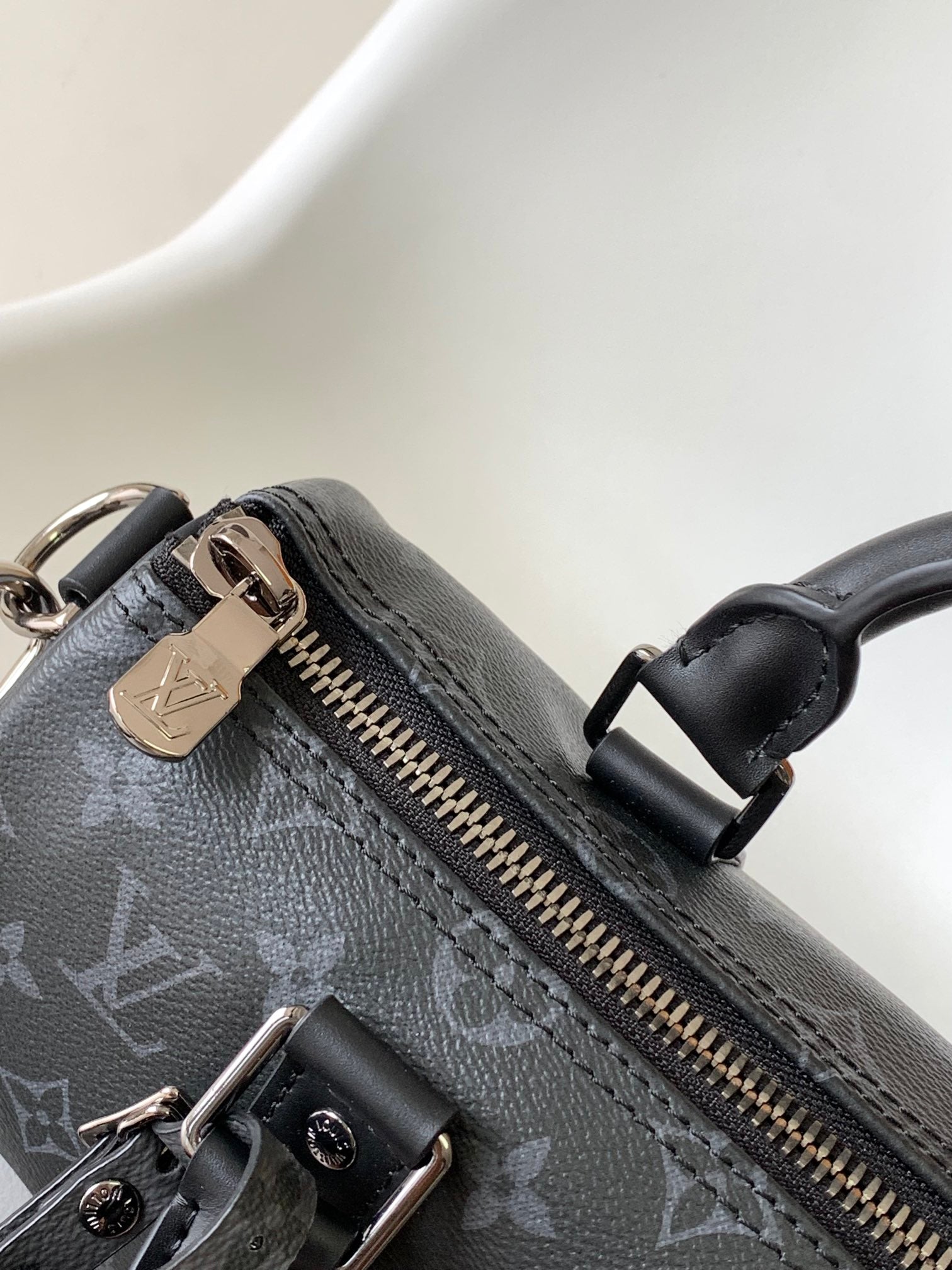 KEEPALL BANDOULIÈRE 25 IN BLACK MONOGRAM HERITAGE CANVAS