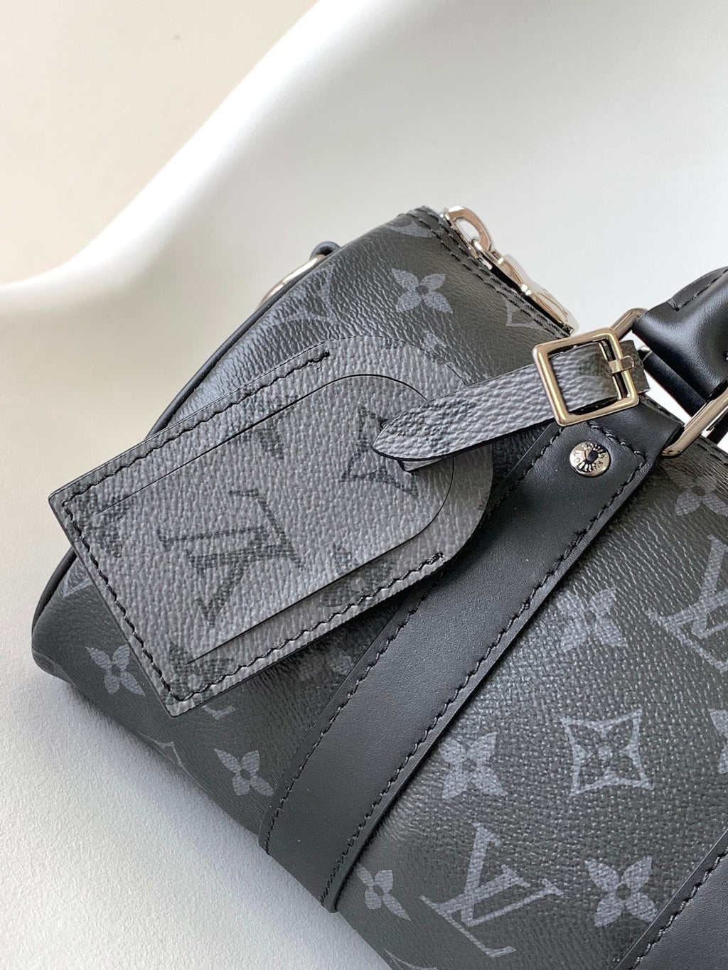 KEEPALL BANDOULIÈRE 25 IN BLACK MONOGRAM HERITAGE CANVAS