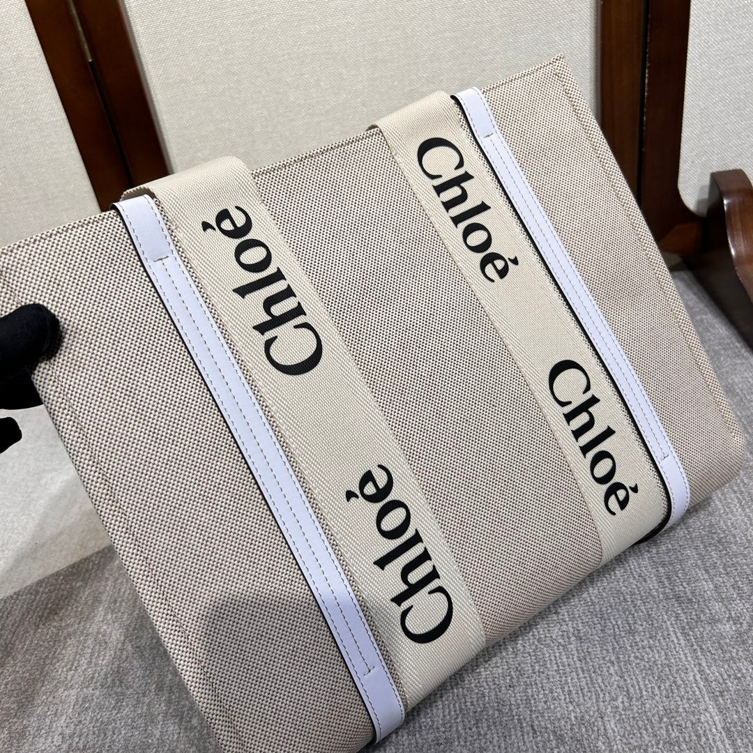 MEDIUM WOODY TOTE BAG 37 IN BEIGE LINEN CANVAS WEBBING BLACK LOGO EMBROIDER WHITE CALFSKIN