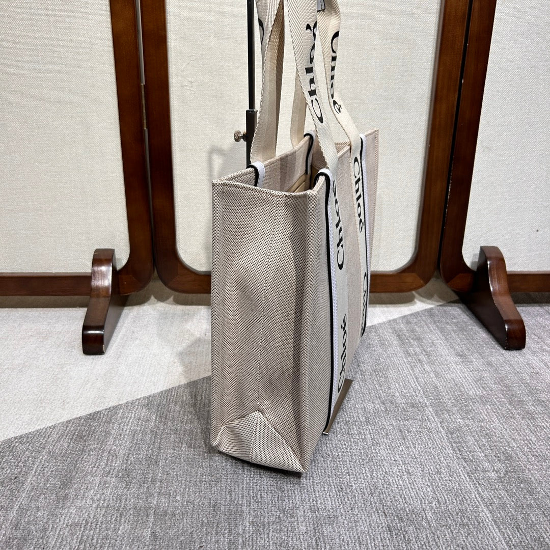 MEDIUM WOODY TOTE BAG 37 IN BEIGE LINEN CANVAS WEBBING BLACK LOGO EMBROIDER WHITE CALFSKIN