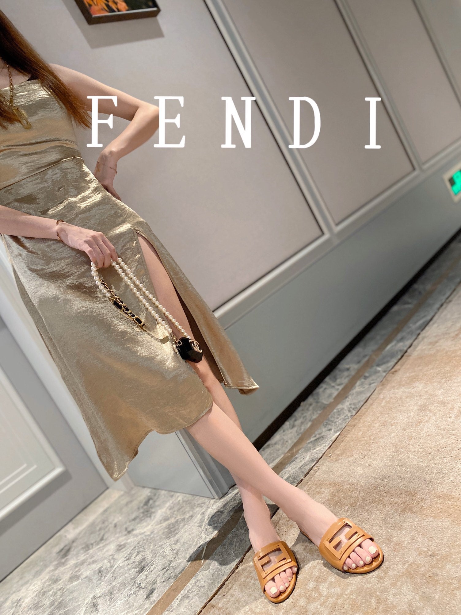 FENDI BAGUETTE SLIDES IN  COPPER BROWN LAMBSKIN