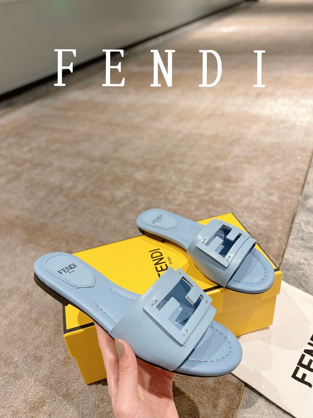 FENDI BAGUETTE SLIDES IN  BABY BLUE LAMBSKIN