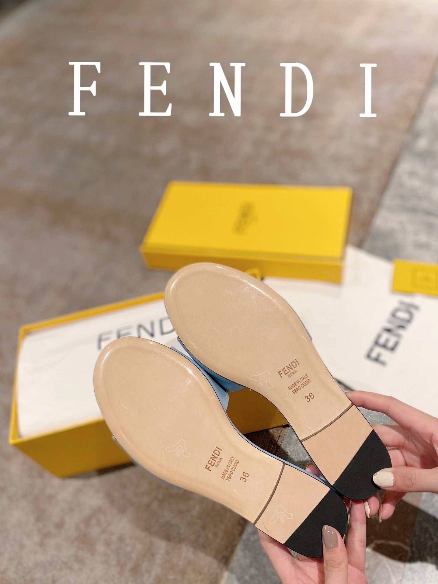 FENDI BAGUETTE SLIDES IN  BABY BLUE LAMBSKIN