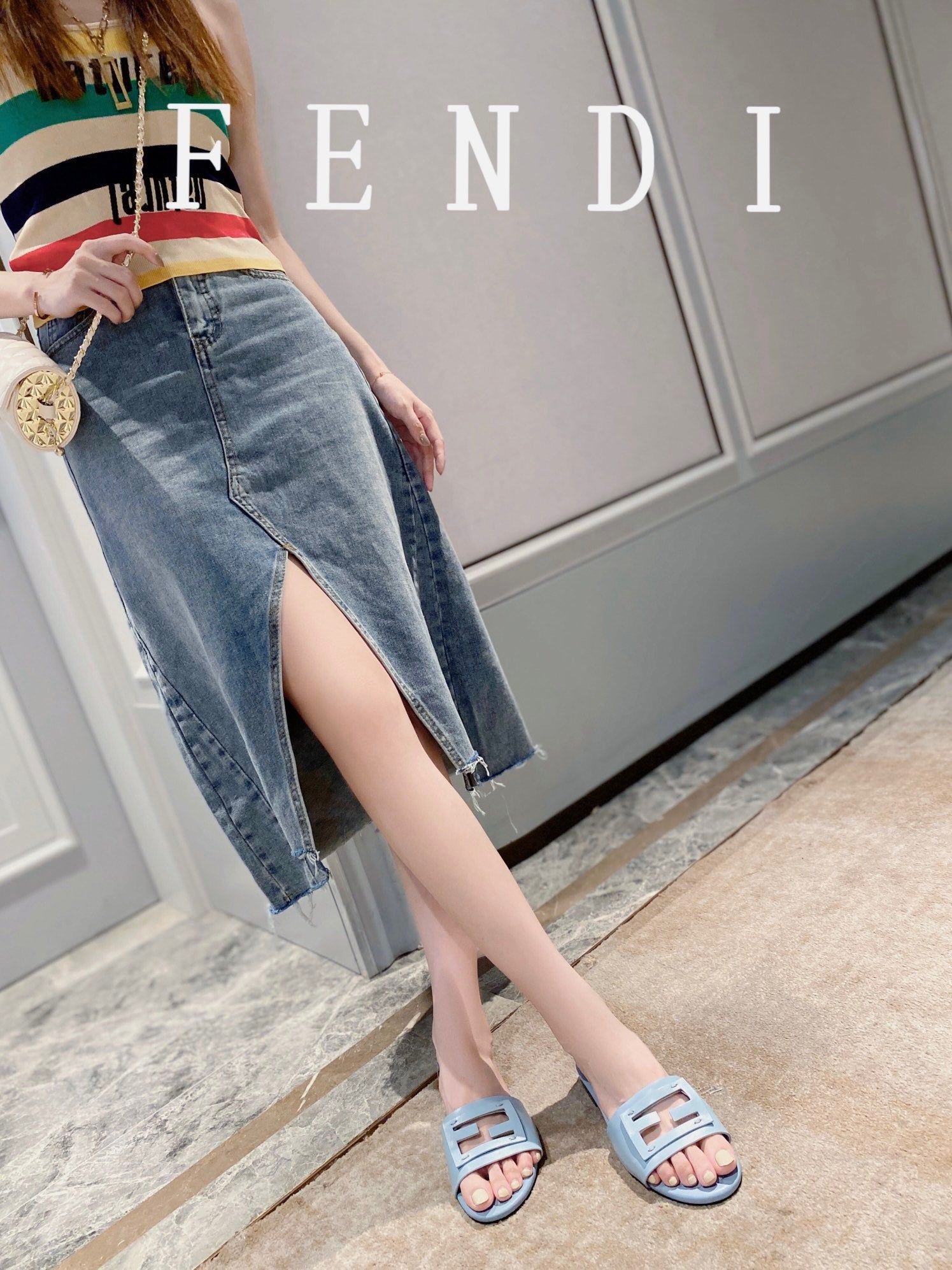 FENDI BAGUETTE SLIDES IN  BABY BLUE LAMBSKIN