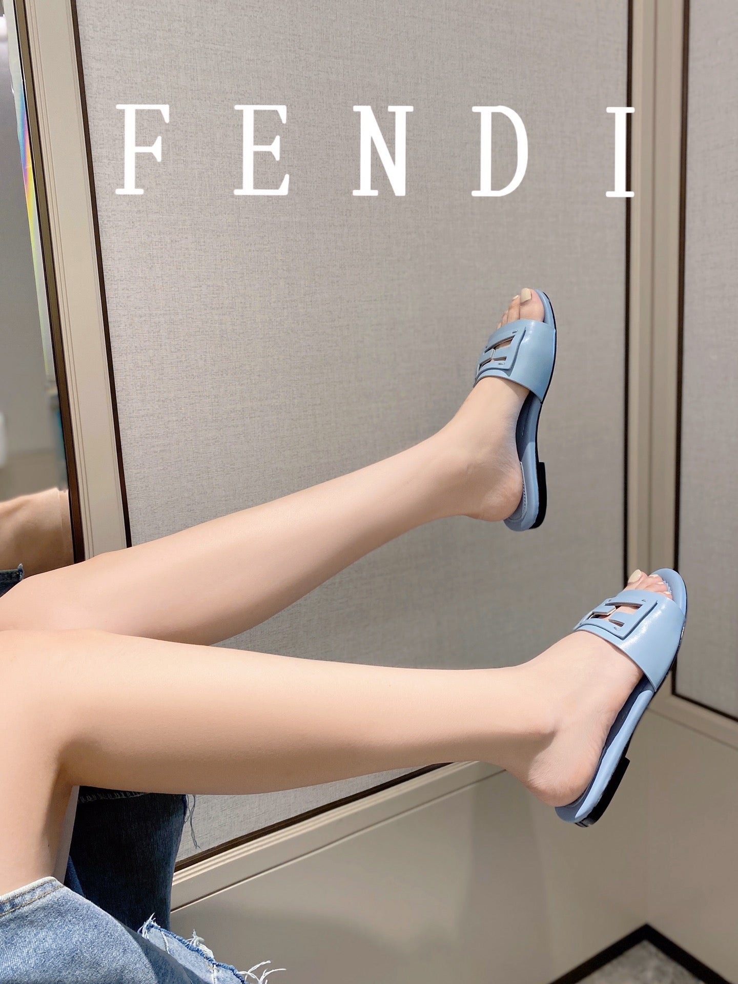 FENDI BAGUETTE SLIDES IN  BABY BLUE LAMBSKIN