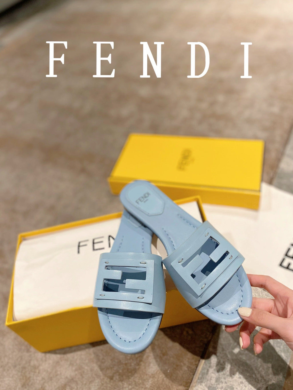 FENDI BAGUETTE SLIDES IN  BABY BLUE LAMBSKIN