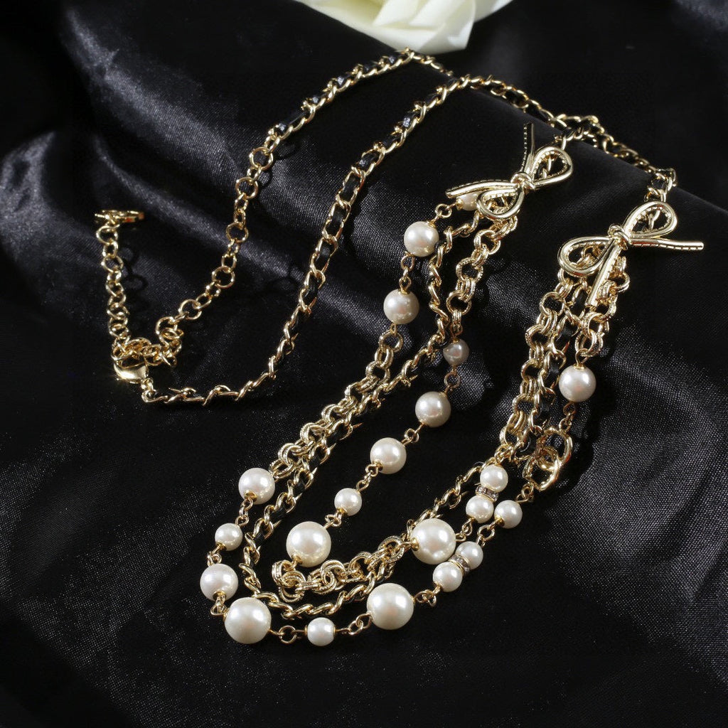 CHANEL 25S GOLD CHAIN BELT WITH PEARL 610440