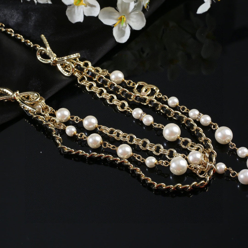 CHANEL 25S GOLD CHAIN BELT WITH PEARL 610440