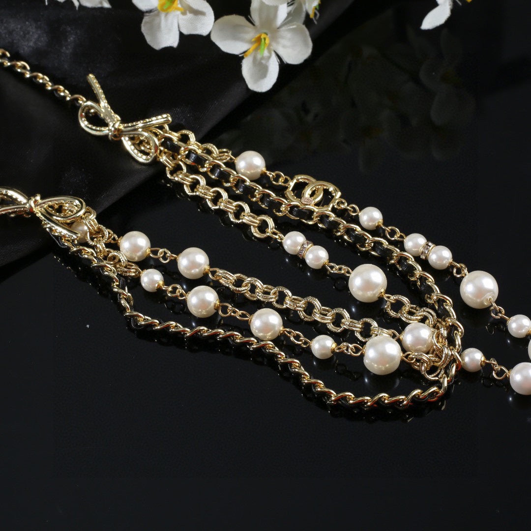 CHANEL 25S GOLD CHAIN BELT WITH PEARL 610440