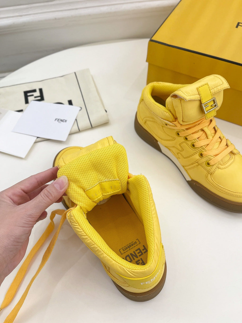 FENDI LOGO SOCK SNEAKER BOOTS IN CORN YELLOW LAMBSKIN