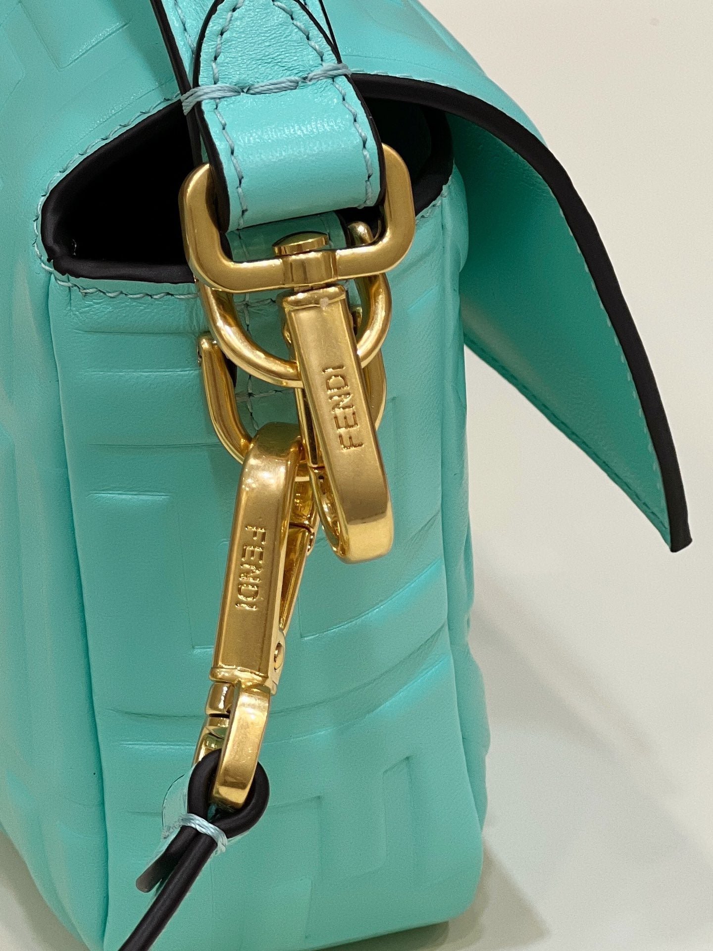 BAGUETTE WITH FF MOTIF 27 IN TURQUOISE SOFT LAMBSKIN GOLD HARDWARE