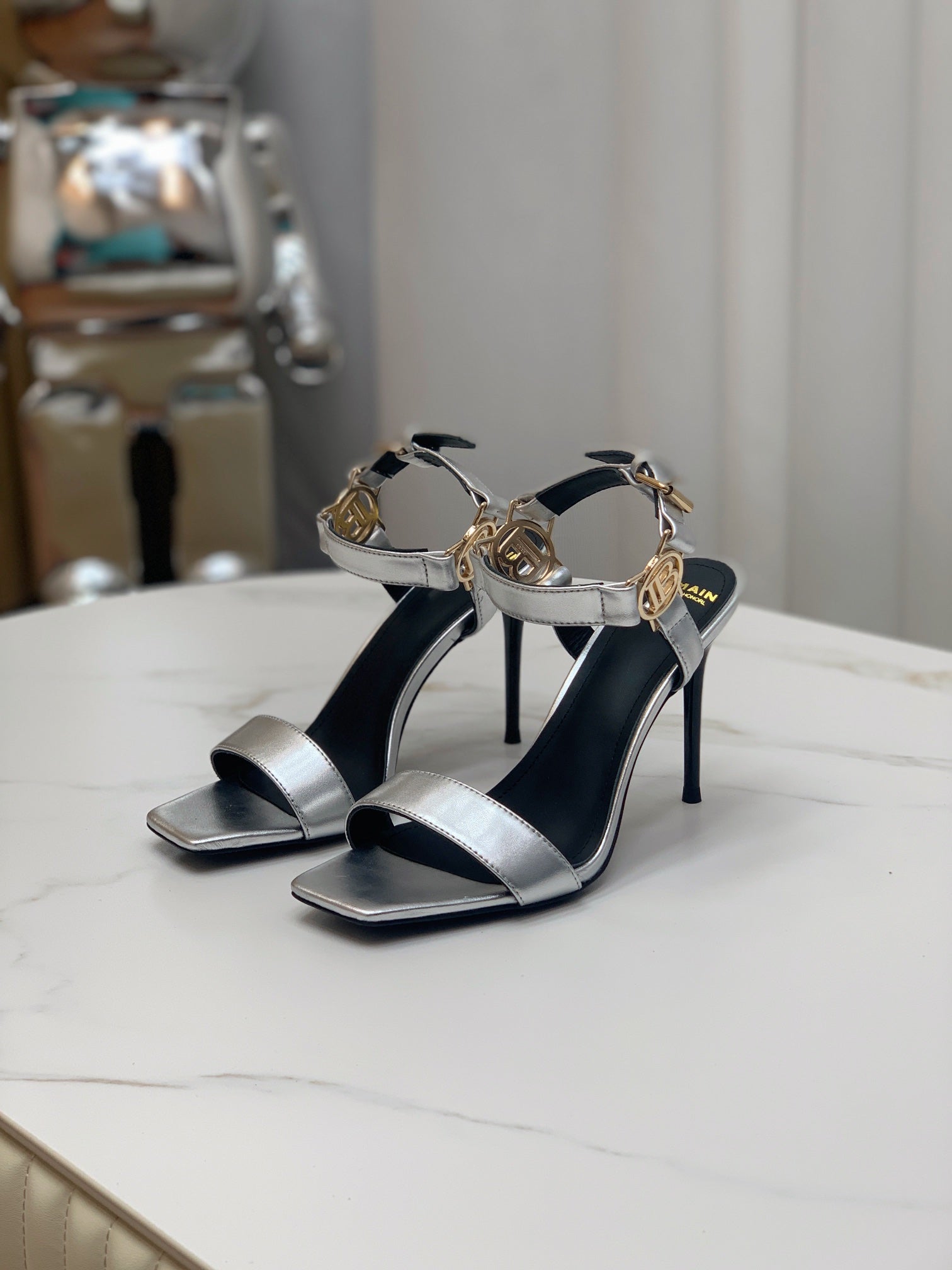 BALMAIN 25S HIGH HEELS WITH B METAL DETAIL 95MM IN SILVER CALFSKIN