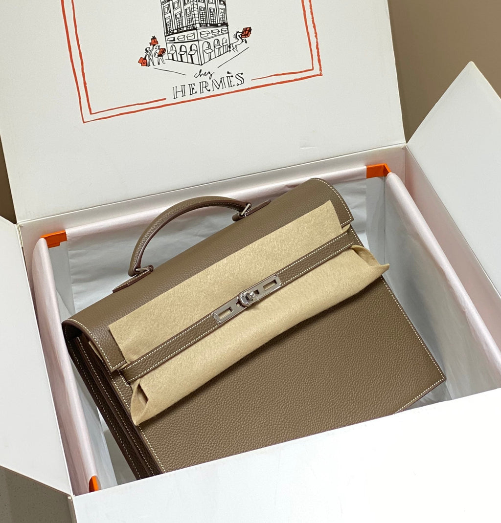 KELLY DEPECHES 34 BRIEFCASE IN ETOUPE TOGO CALFSKIN SILVER HARDWARE