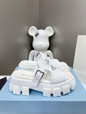 MONOLITH SLIPPER SANDALS IN WHITE RUBBER