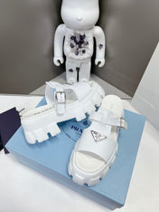 MONOLITH SLIPPER SANDALS IN WHITE RUBBER