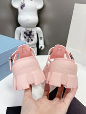 MONOLITH SLIPPER SANDALS IN LIGHT PINK RUBBER