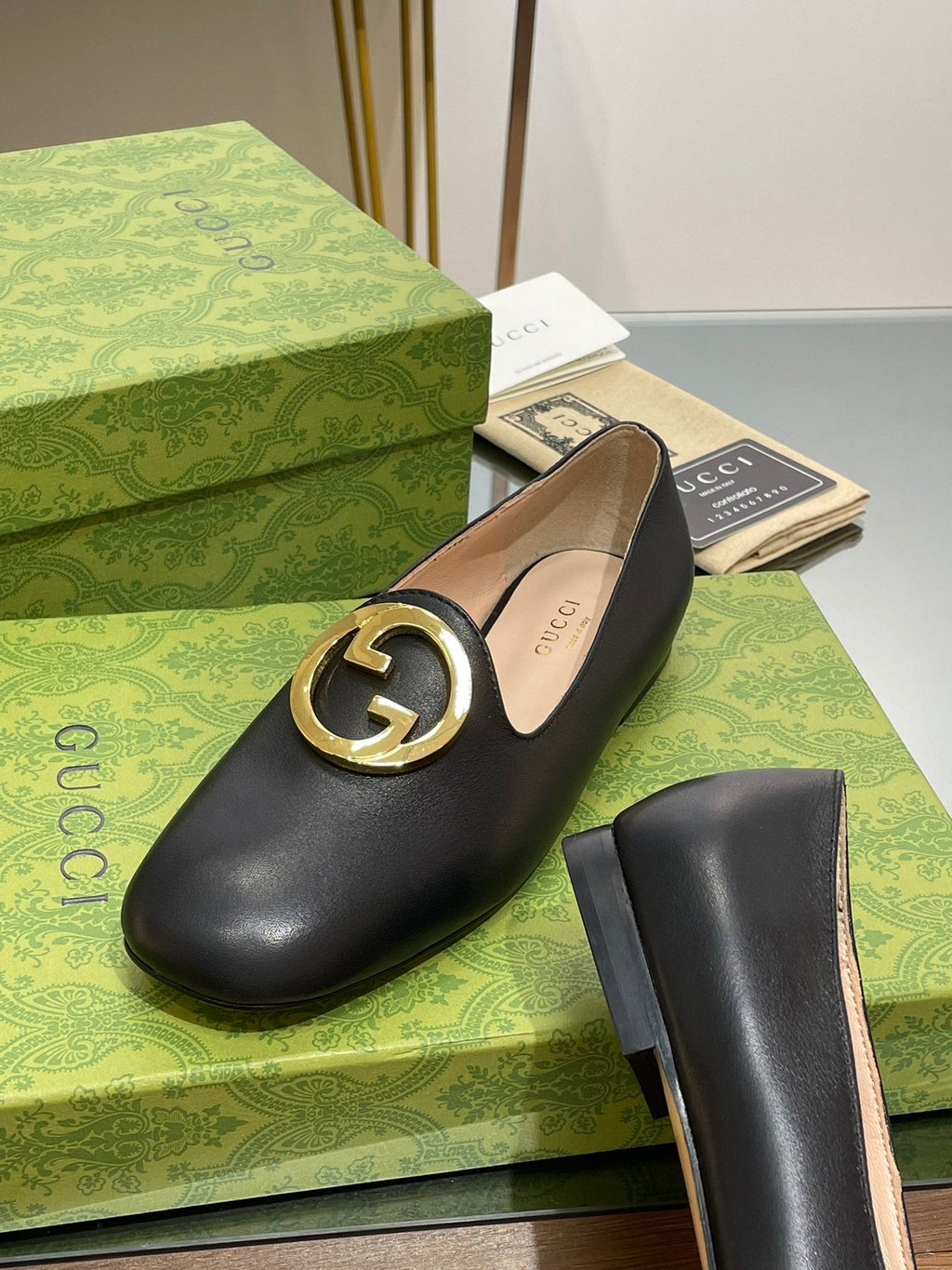 BLONDIE LOGO-PLAQUE LOAFERS IN BLACK CALFSKIN WITH GOLD HARDWARE