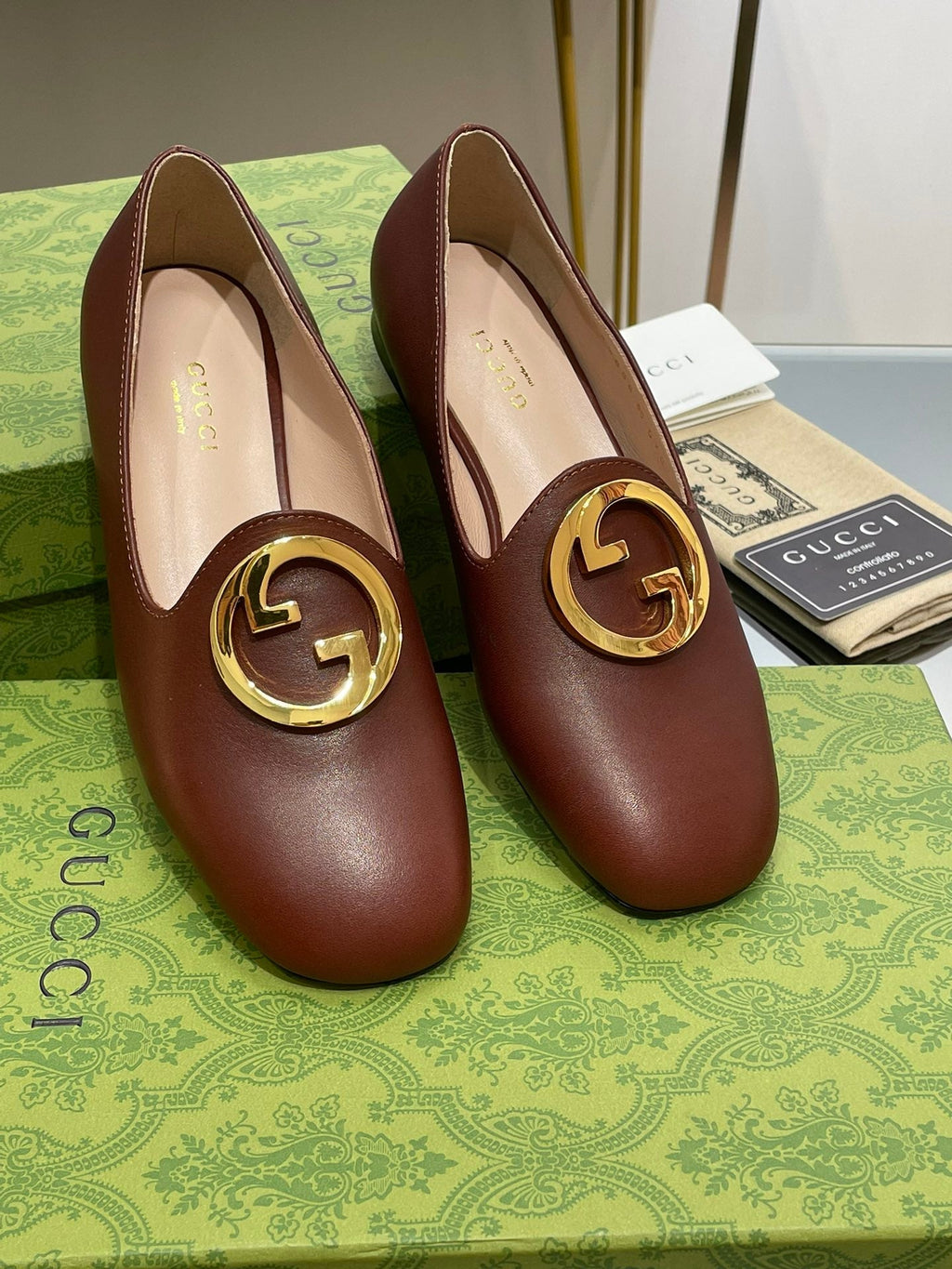 BLONDIE LOGO-PLAQUE LOAFERS IN SYRUP BROWN CALFSKIN WITH GOLD HARDWARE