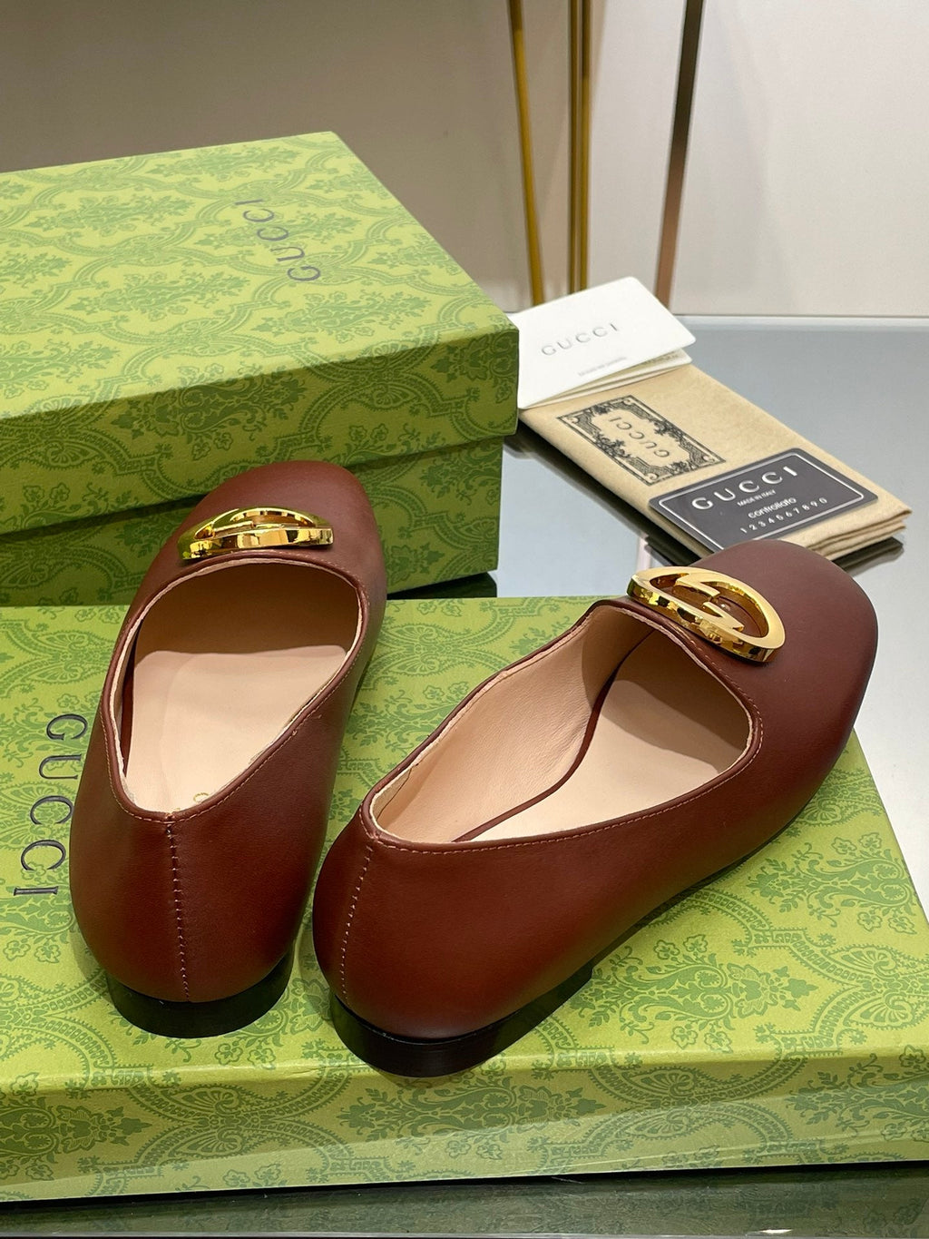 BLONDIE LOGO-PLAQUE LOAFERS IN SYRUP BROWN CALFSKIN WITH GOLD HARDWARE