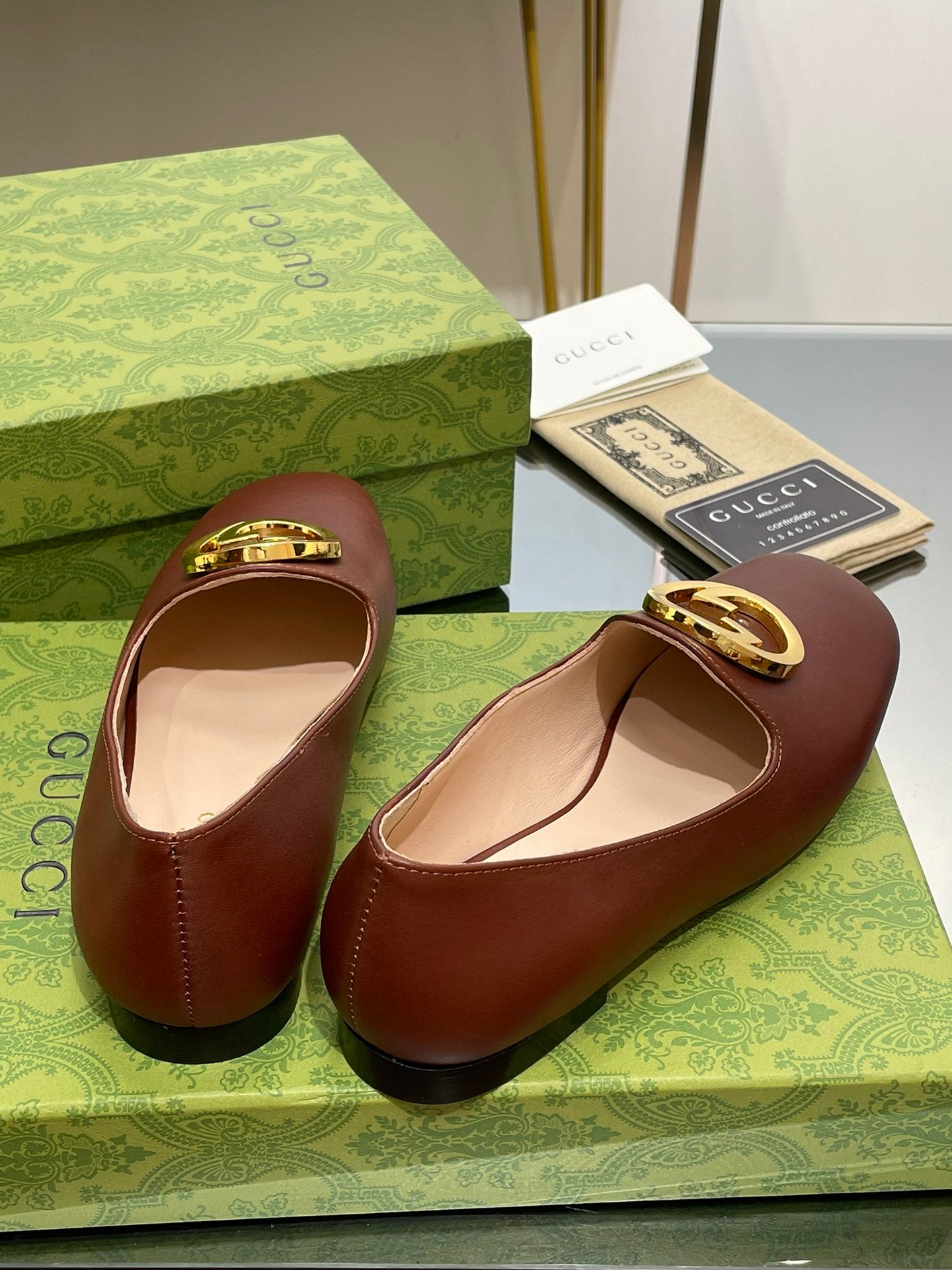 BLONDIE LOGO-PLAQUE LOAFERS IN SYRUP BROWN CALFSKIN WITH GOLD HARDWARE