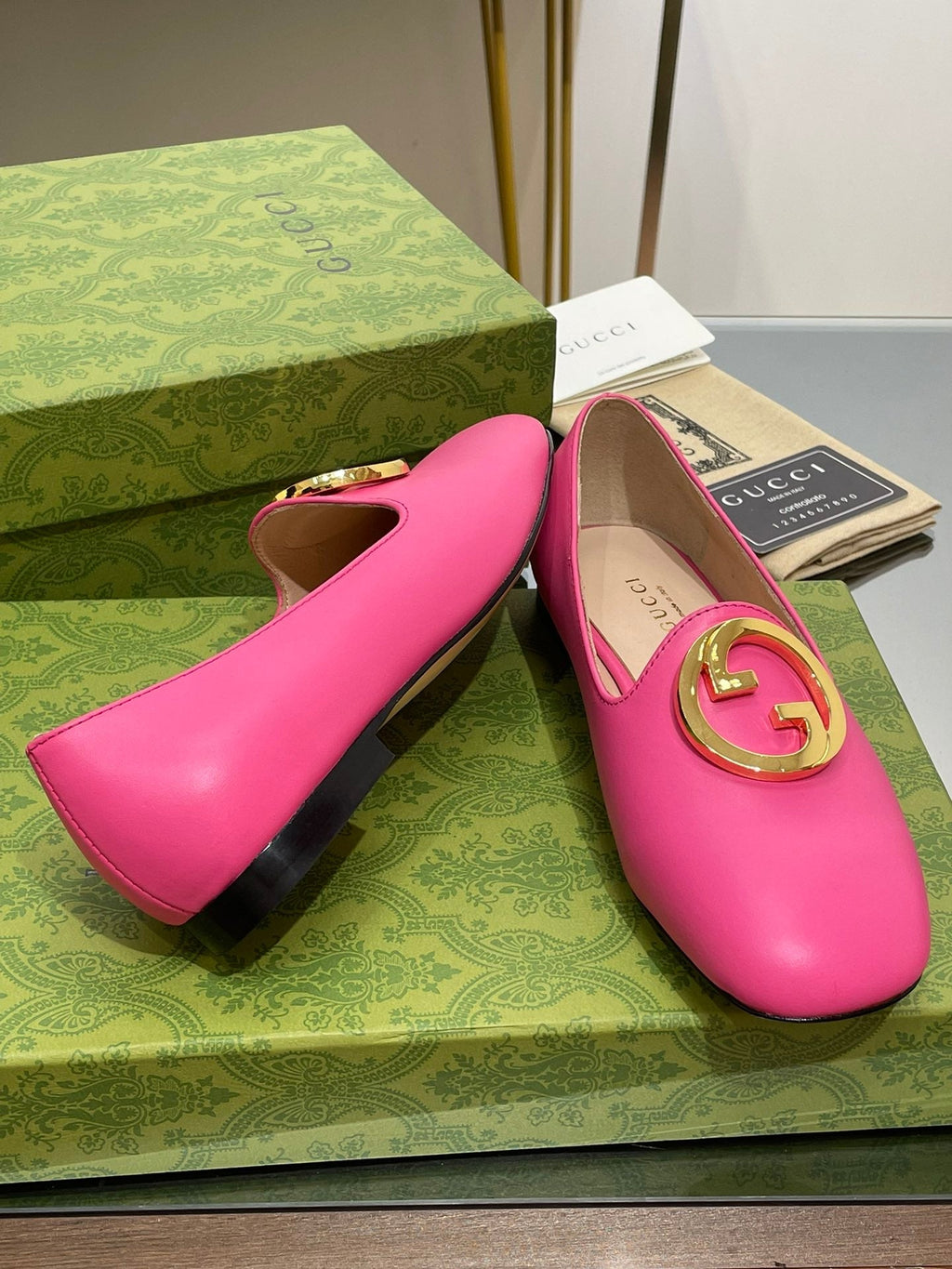 BLONDIE LOGO-PLAQUE LOAFERS IN BRIGHT PINK CALFSKIN WITH GOLD HARDWARE