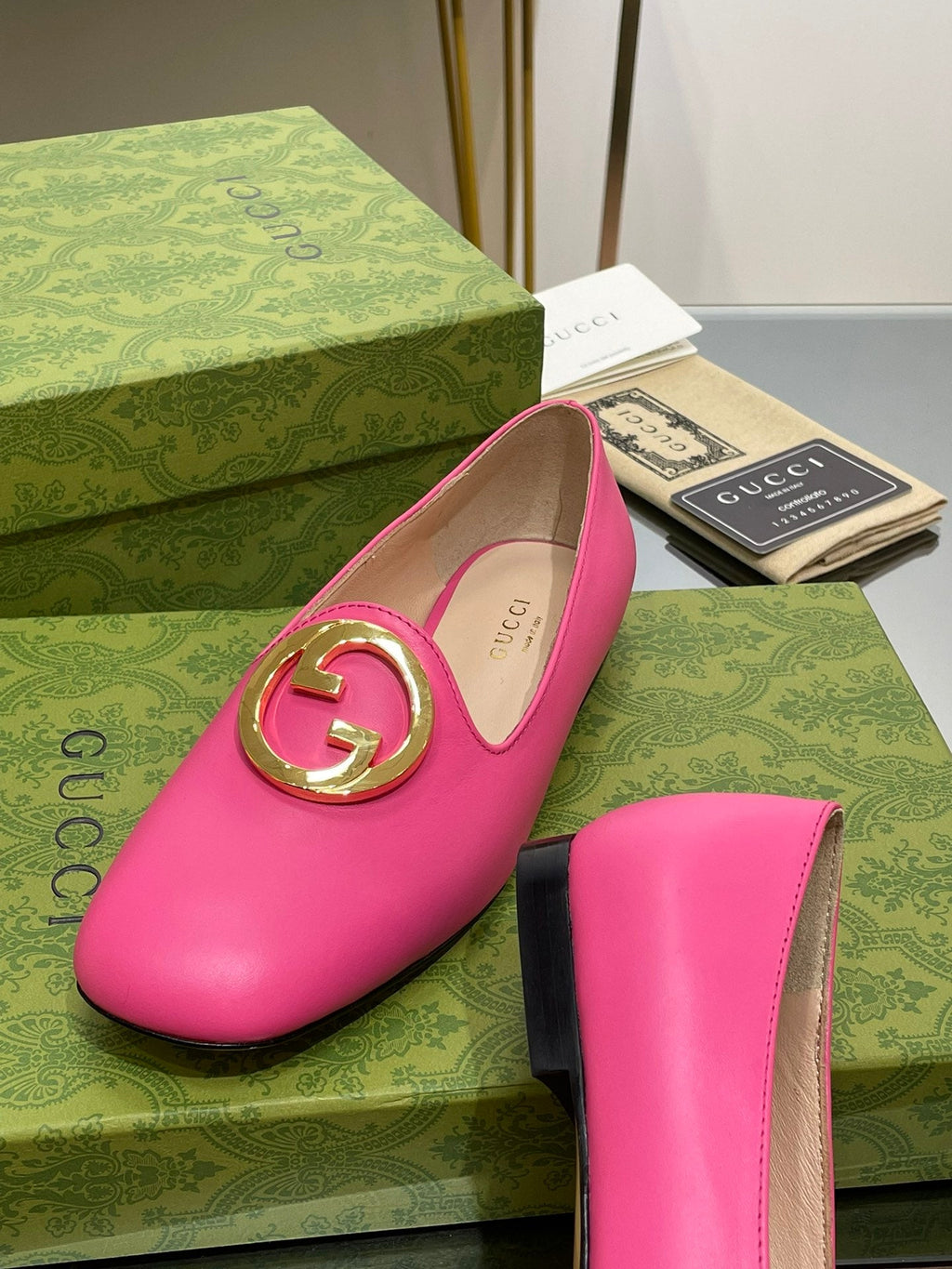 BLONDIE LOGO-PLAQUE LOAFERS IN BRIGHT PINK CALFSKIN WITH GOLD HARDWARE