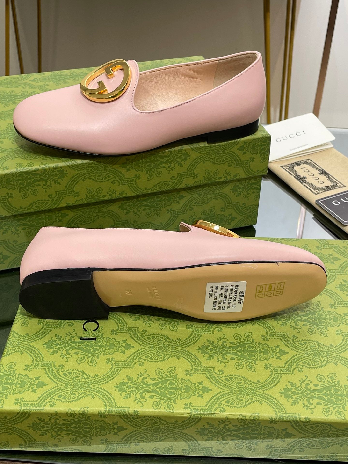 BLONDIE LOGO-PLAQUE LOAFERS IN LIGHT PINK CALFSKIN WITH GOLD HARDWARE