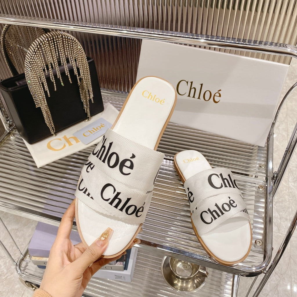 CHLOÉ WOODY SLIPPER IN WHITE MIX BLACK CANVAS