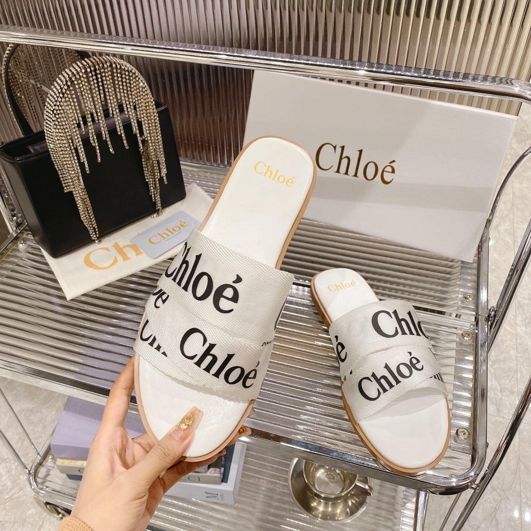 CHLOÉ WOODY SLIPPER IN WHITE MIX BLACK CANVAS